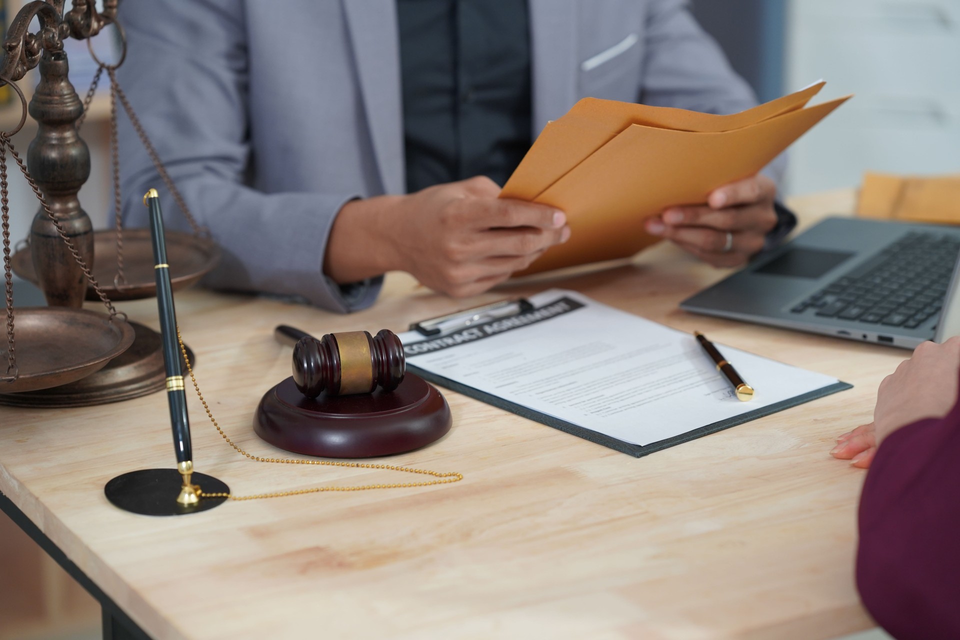 Judge Hammer with Lawyers Judge has a team meeting at Legal Services Office Hammer Judge with Lawyers Justice has a team meeting Legal concept of injustice